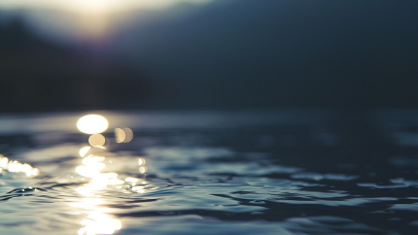The image is an illustration showing a photo of a rippling water surface.